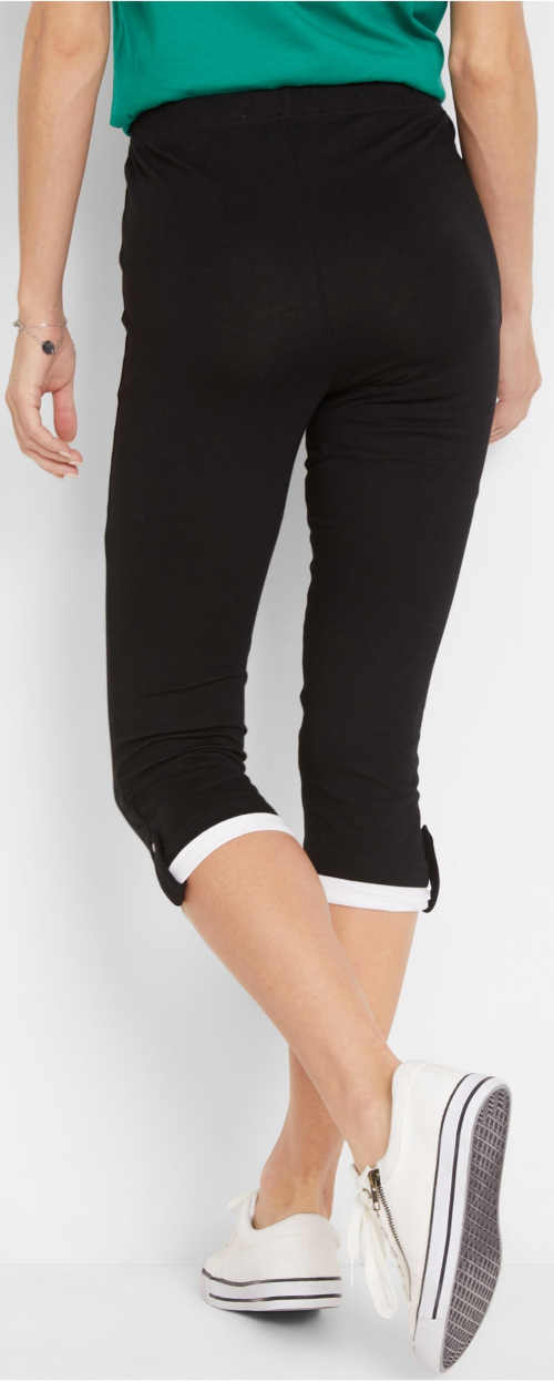 Fekete capri leggings, a lábszár végén hajtással